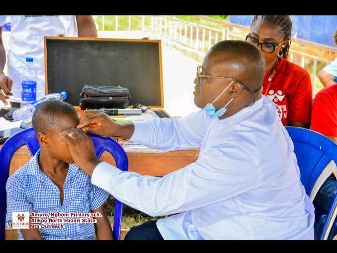 Our Medical Team in Action while our Chairperson watches with keen interest.