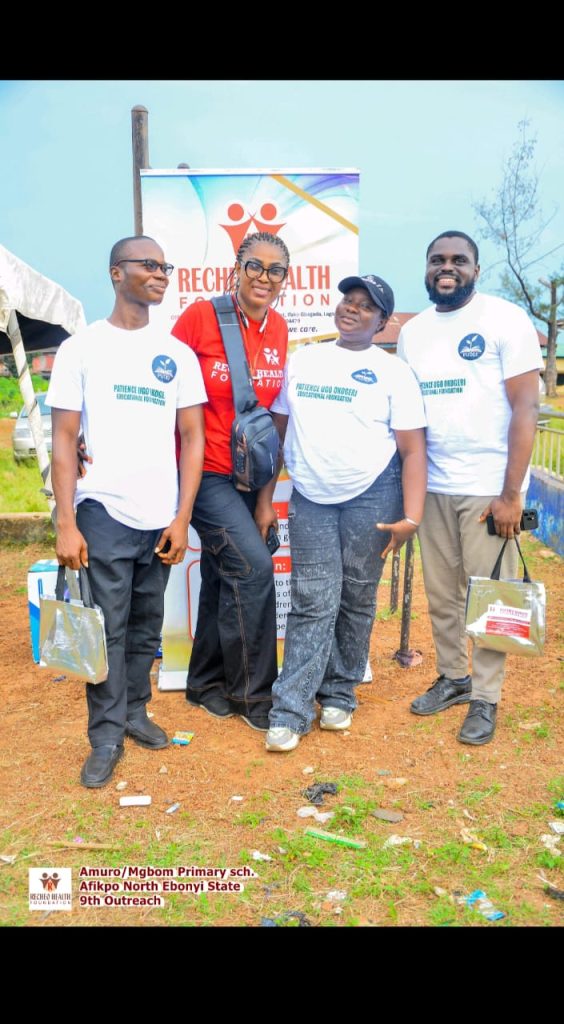 Our Respected Chairperson in group picture with volunteers from Patience Ugo Okogeri Education Foundation (PUOEF) who came to grace the event.